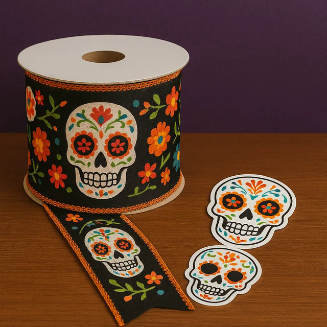Day of the Dead ribbon spool with sugar skull and floral pattern, alongside colorful sugar skull stickers—perfect accessories for crafts, gifts, and Día de los Muertos decor.