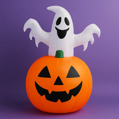 Halloween inflatable yard decoration with smiling ghost rising from jack-o’-lantern, perfect for outdoor displays and festive front yard fun.