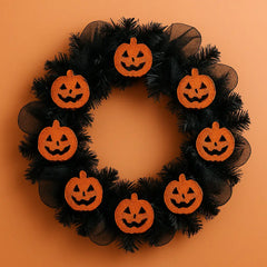 Halloween wreath made of black garland and glittery orange jack-o'-lanterns, perfect for spooky front door or indoor seasonal decoration.