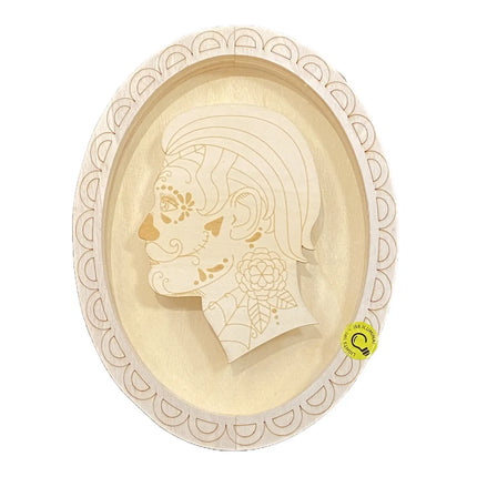 DIY 10-inch sugar skull LED wood Halloween decor featuring a Day of the Dead silhouette in an oval frame, paintable and customizable with built-in lights for festive wall display.