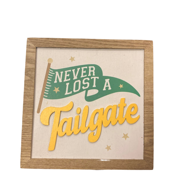Celebrate it Never Lost a Tailgate Sign 7x7in