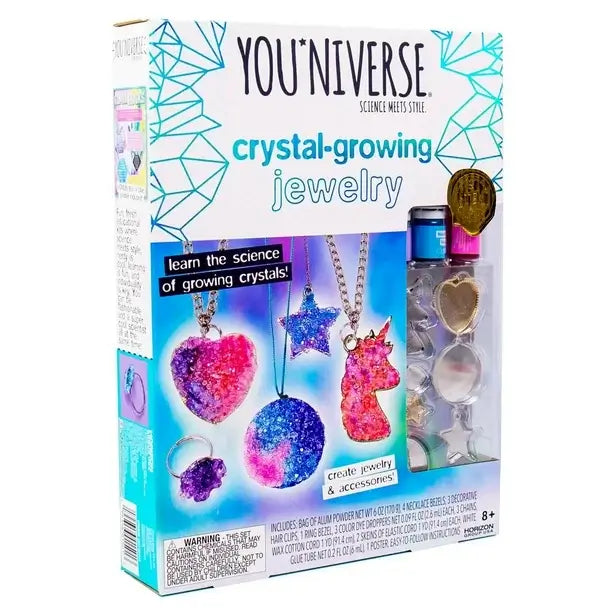 YOUniverse Crystal Growing Jewelry Kit angled packaging view featuring colorful crystal jewelry pieces, accessories, and crafting materials for kids 8+