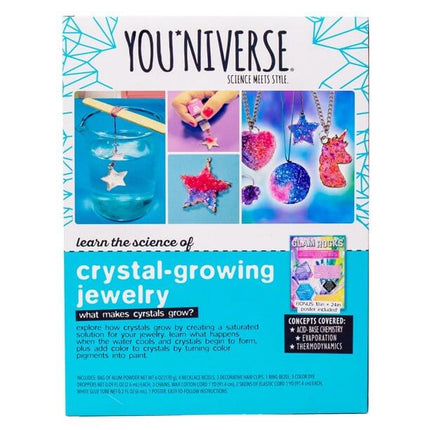 Back of the YOUniverse Crystal Growing Jewelry Kit packaging showcasing step-by-step crystal-growing process, finished jewelry pieces, and educational concepts