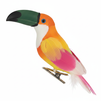 Close-up of decorative toucan bird ornament showing green beak, orange to yellow to pink to white feather detail and alligator clip