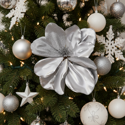 Ashland silver 8 inch decorative floral pick tucked into a Christmas tree among silver and white ornaments and fairy lights