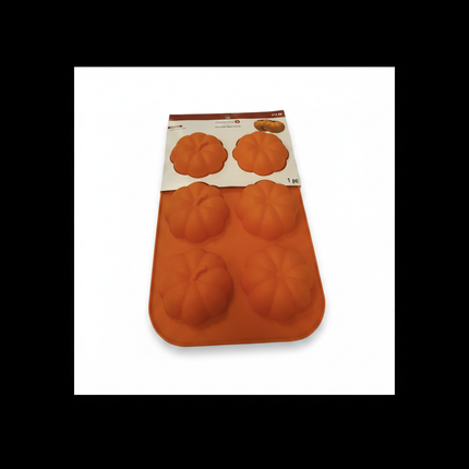Celebrate It orange silicone pumpkin shaped treat mold with 4 cavities on white background