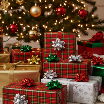 Celebrate It peel and stick gift wrapping bows in assorted colors on wrapped Christmas presents under a tree