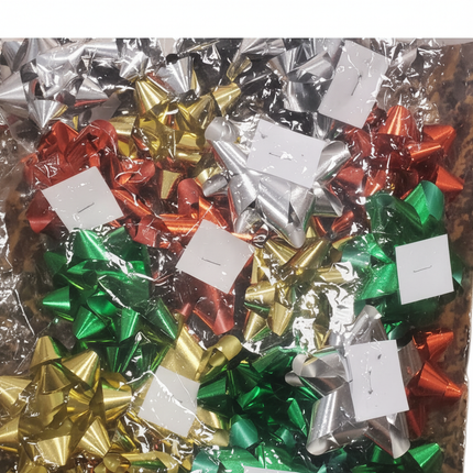 Close-up of Celebrate It peel and stick gift wrapping bows showing color variety and bow texture detail