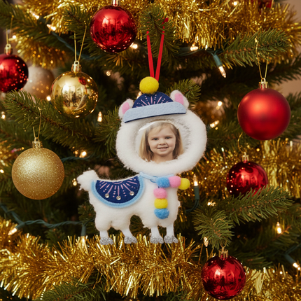 Studio Decor Felt Llama Christmas Ornament hanging on decorated Christmas tree