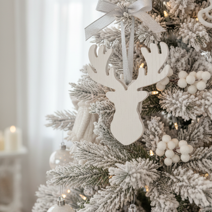 White DIY moose shape wood ornament 5x4 inch hanging on a Christmas tree with silver ribbon
