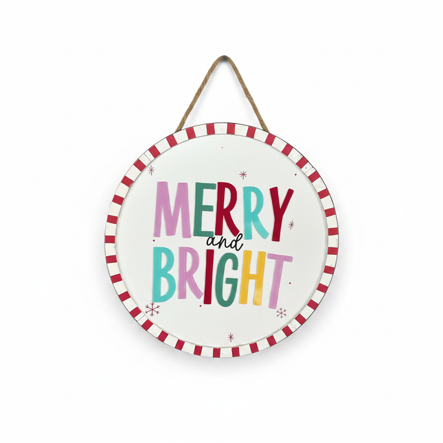 Round white wall sign with colorful Merry and Bright lettering and red white candy stripe border on white background
