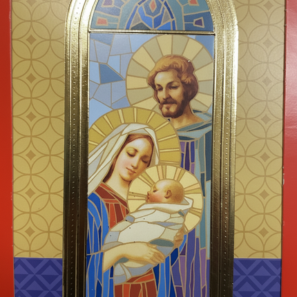 Close-up of Holy Family Nativity stained glass illustration showing Mary holding baby Jesus with Joseph and gold arch frame