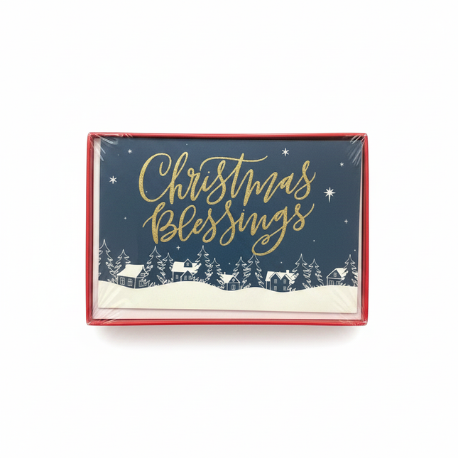 Christmas Blessings cards box front view with gold foil script on navy starry night winter village design, white background