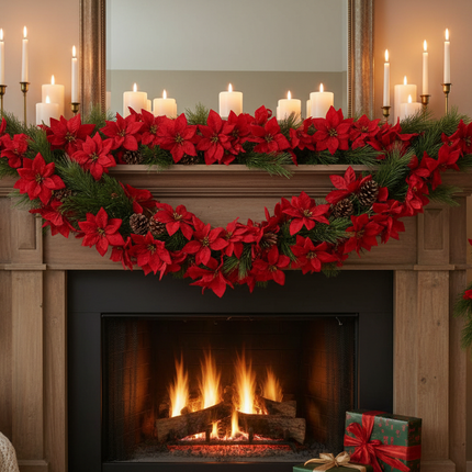 Ashland red poinsettia chain garland 6ft draped along a fireplace mantel with candles and pine greenery