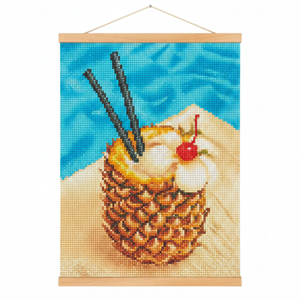 Completed diamond art canvas of a pineapple tropical drink with sparkling round gems displayed in a wooden hanger frame