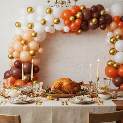 Celebrate It Thanksgiving balloon garland 10 feet decorating a Thanksgiving dinner table backdrop with orange gold and brown balloons