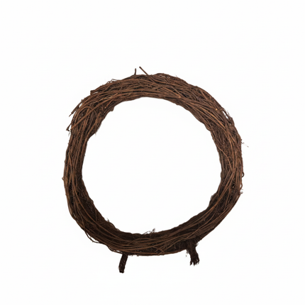 Large natural grapevine wreath base with small standing feet on white background