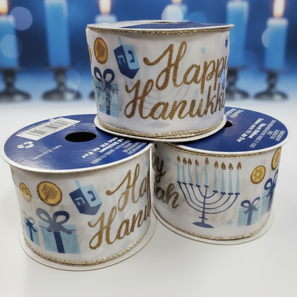 Close up of Celebrate It Hanukkah wired ribbon 2.5in wide showing Happy Hanukkah gold script menorah dreidel and gold coin motifs in blue and gold on cream background
