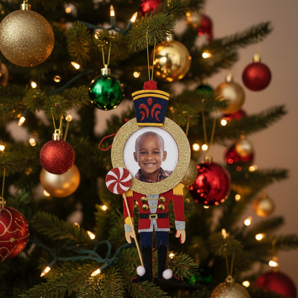 Studio Decor Felt Nutcracker Peppermint Photo Ornament hanging on decorated Christmas tree