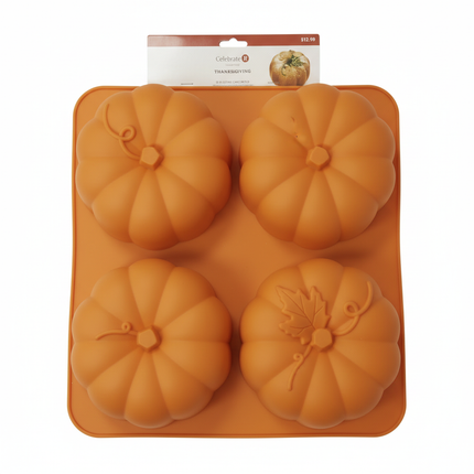 Celebrate It orange silicone 3D cake mold with 4 large pumpkin shaped cavities on white background
