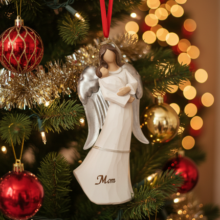 St Nicholas Square Mom Angel ornament hanging on decorated Christmas tree