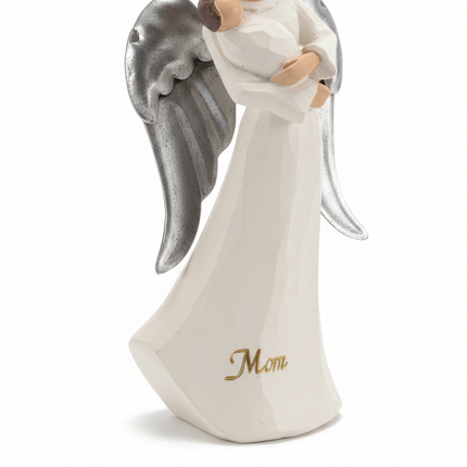 Close-up detail of St Nicholas Square Mom Angel ornament showing silver wings and gold Mom script